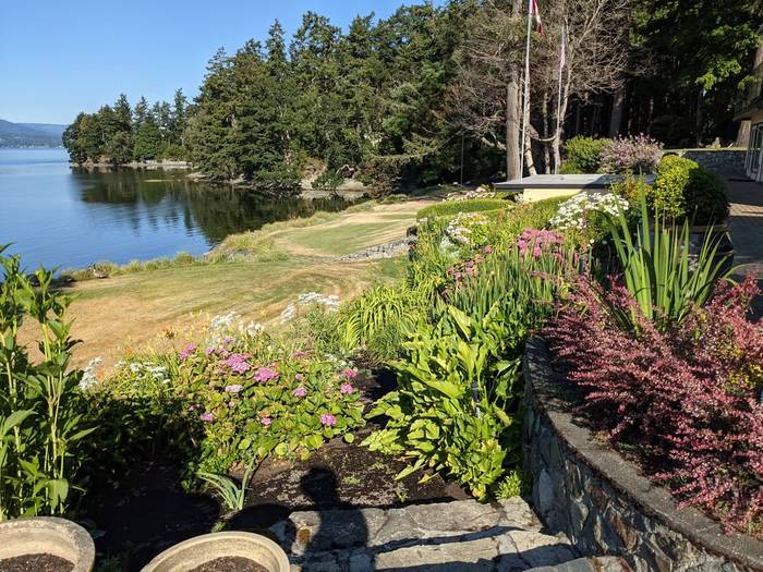 Stone-walled estate garden along the waterfront